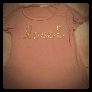 Shirt that says "loved"